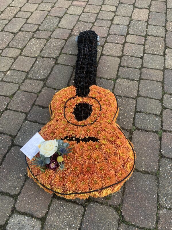 Guitar funeral flower tribute