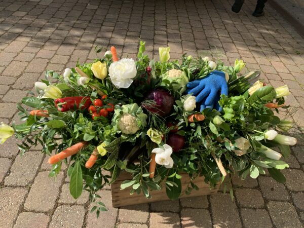 Vegetable patch funearl flower tribute