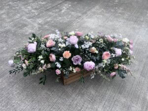 Casket spray funeral flower tribute