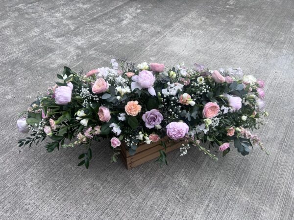 Casket spray funeral flower tribute