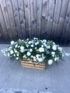 Casket spray funeral flower tribute white