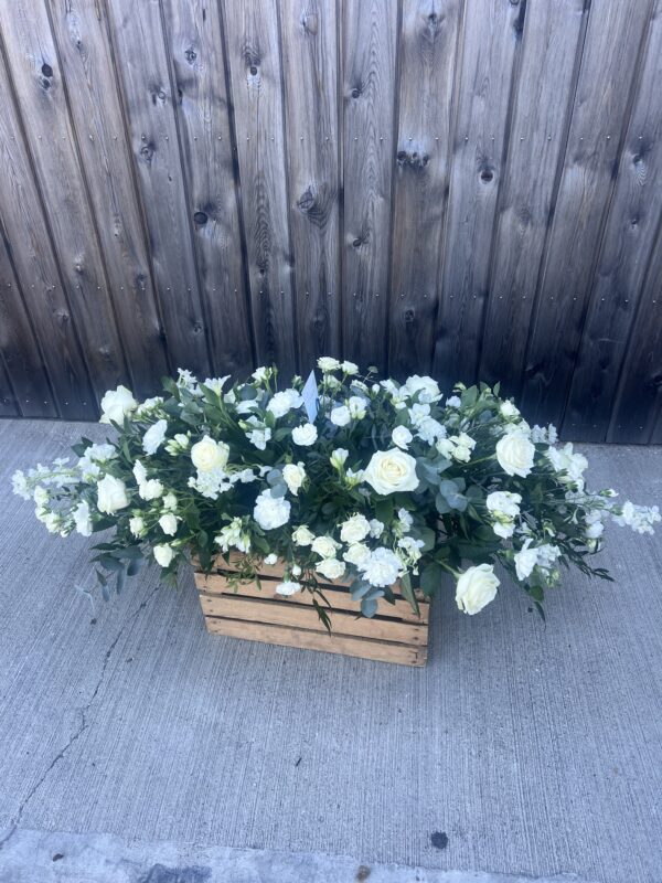 Casket spray funeral flower tribute white
