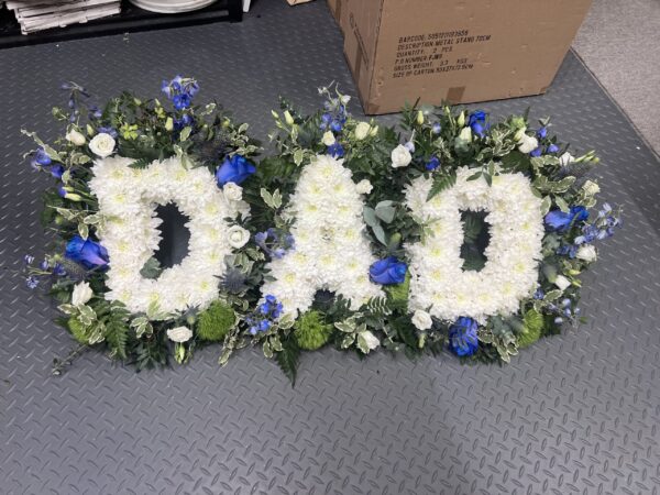 Dad funeral flower tribute blue and green