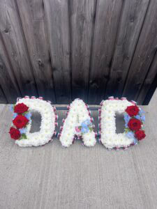 Dad funeral flower tribute red roses