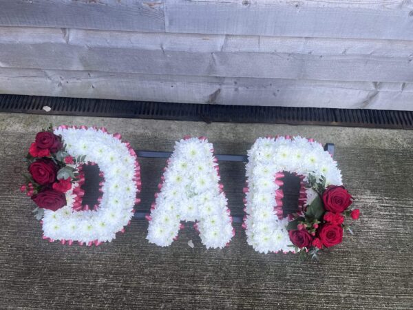 Dad funeral flower tribute red roses