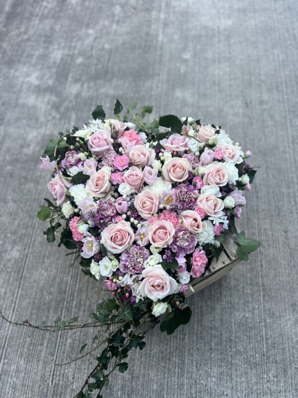 Heart funeral flower tribute pink