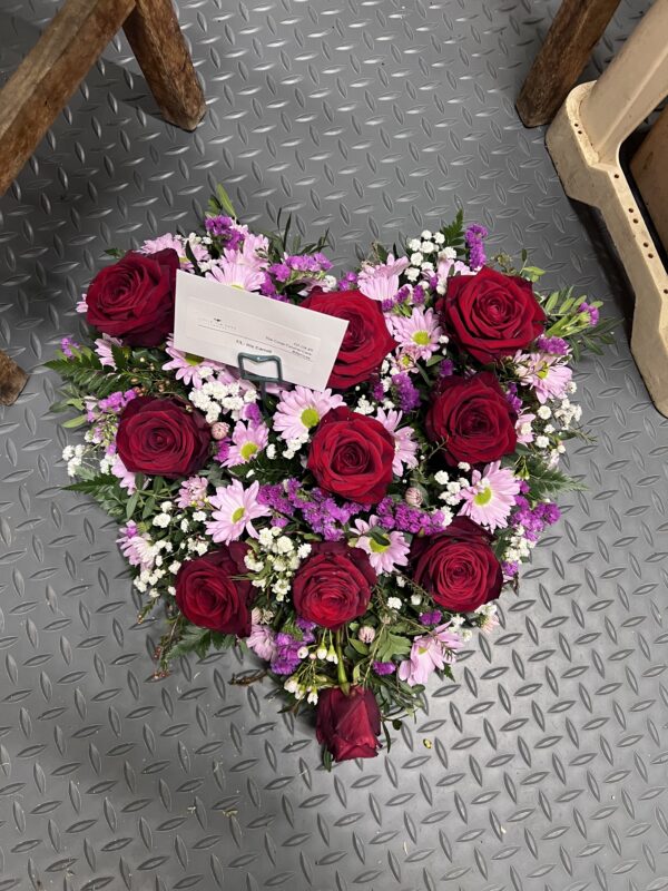 Heart funeral flower tribute red and pink
