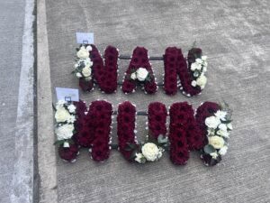 Mum and nan funeral flower tributes red