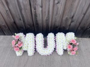 Mum funeral flower tribute pink