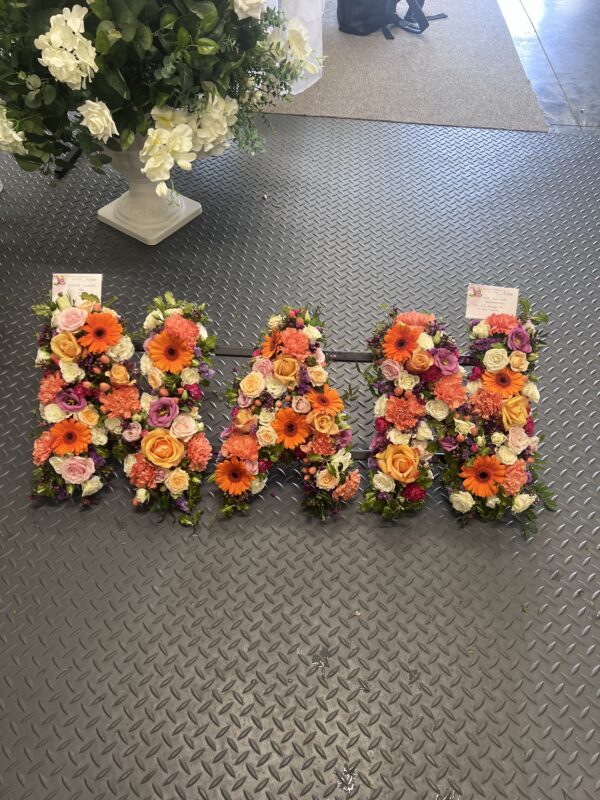 Nan funeral flower tribute orange