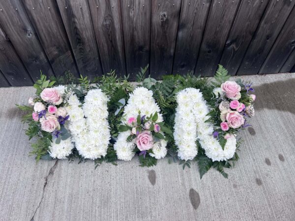 Nan funeral flower tribute pink
