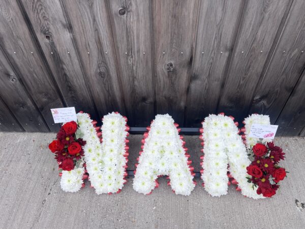 Nan funeral flower tribute red roses