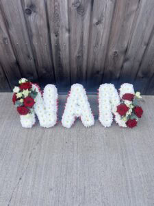 Nan funeral flower tribute red roses