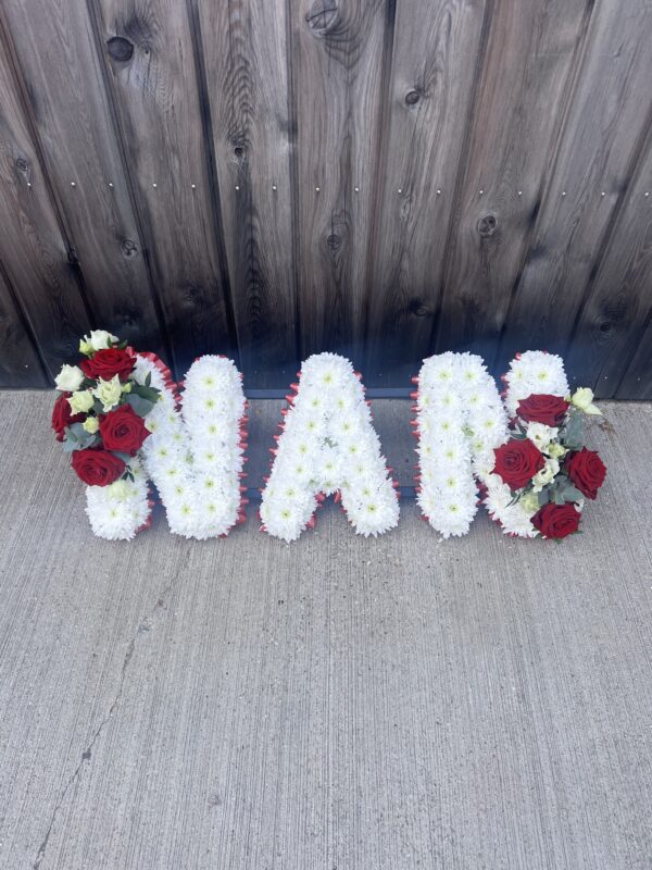 Nan funeral flower tribute red roses