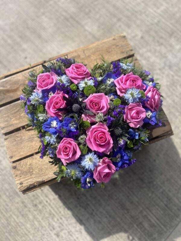 Heart pink funeral flower tribute