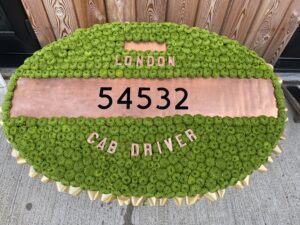 London Cabbie Badge flower tribute