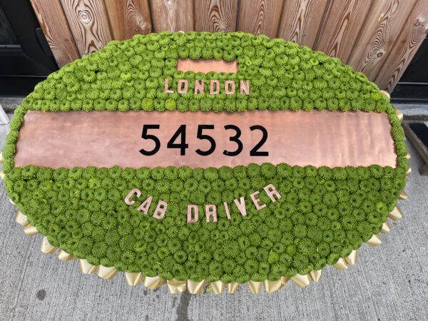 London Cabbie Badge flower tribute