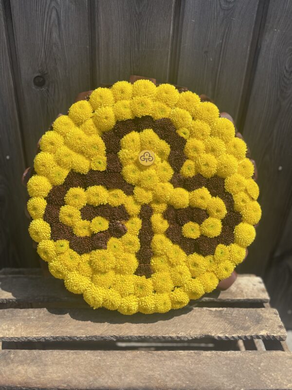 Brownie Badge funeral flower tribute
